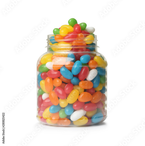 Cuadro en lienzo Glass jar of tasty bright jelly beans isolated on white