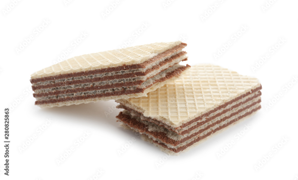 Delicious broken crispy wafer on white background. Sweet food Delicious broken crispy wafer on white background. Sweet food