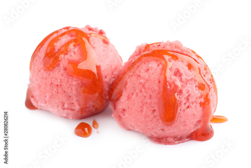 Scoops of delicious strawberry ice cream with syrup on white background