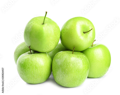 Pile of fresh ripe green apples on white background