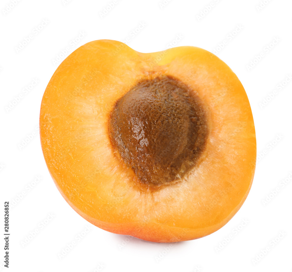 Half of delicious ripe sweet apricot with kernel on white background