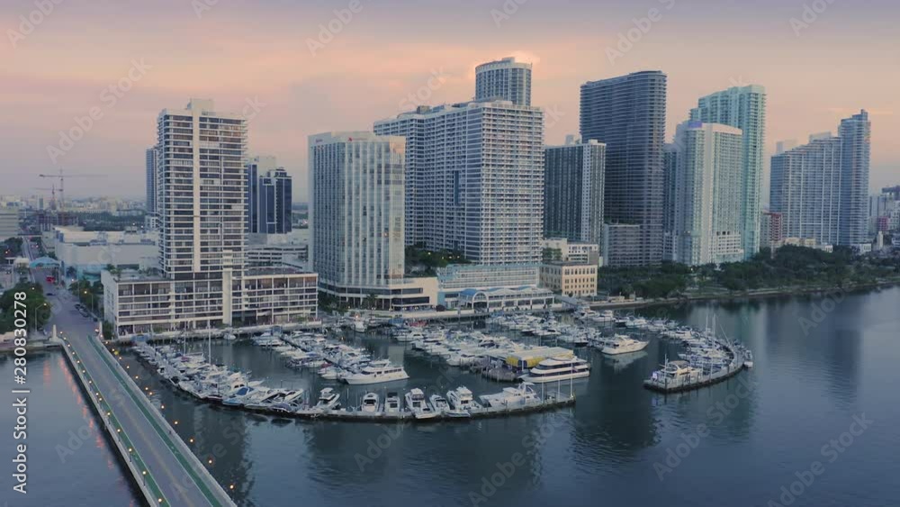 Description: Aerial over the Venetian Causeway in downtown Miami with a view to a boat harbor at sunrise. 25 July 2019 Description: Aerial over the Venetian Causeway in downtown Miami with a view to a boat harbor at sunrise. 25 July 2019