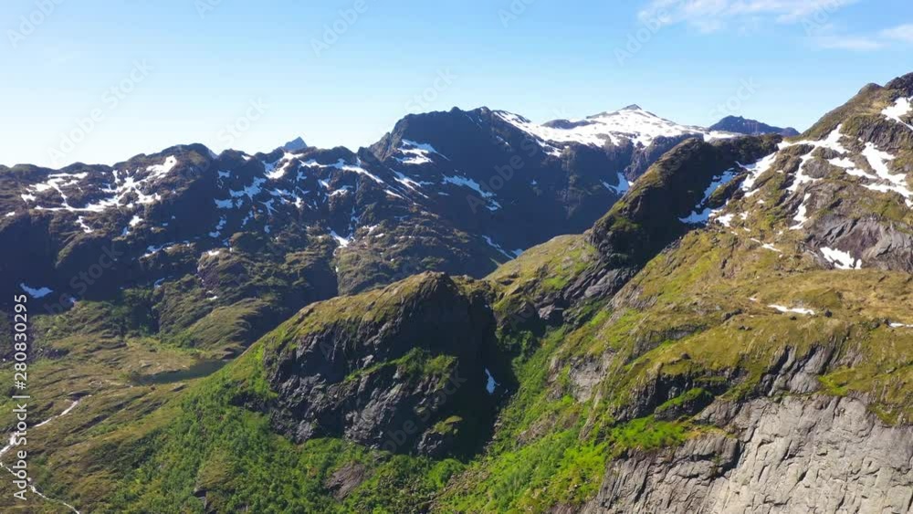 aerial view. flight over the Stuvdalsvatnet lake, Sorvagen village. trek on the Munkebu.Lofoten Islands,Norway.Camera move forward aerial view. flight over the Stuvdalsvatnet lake, Sorvagen village. trek on the Munkebu.Lofoten Islands,Norway.Camera move forward
