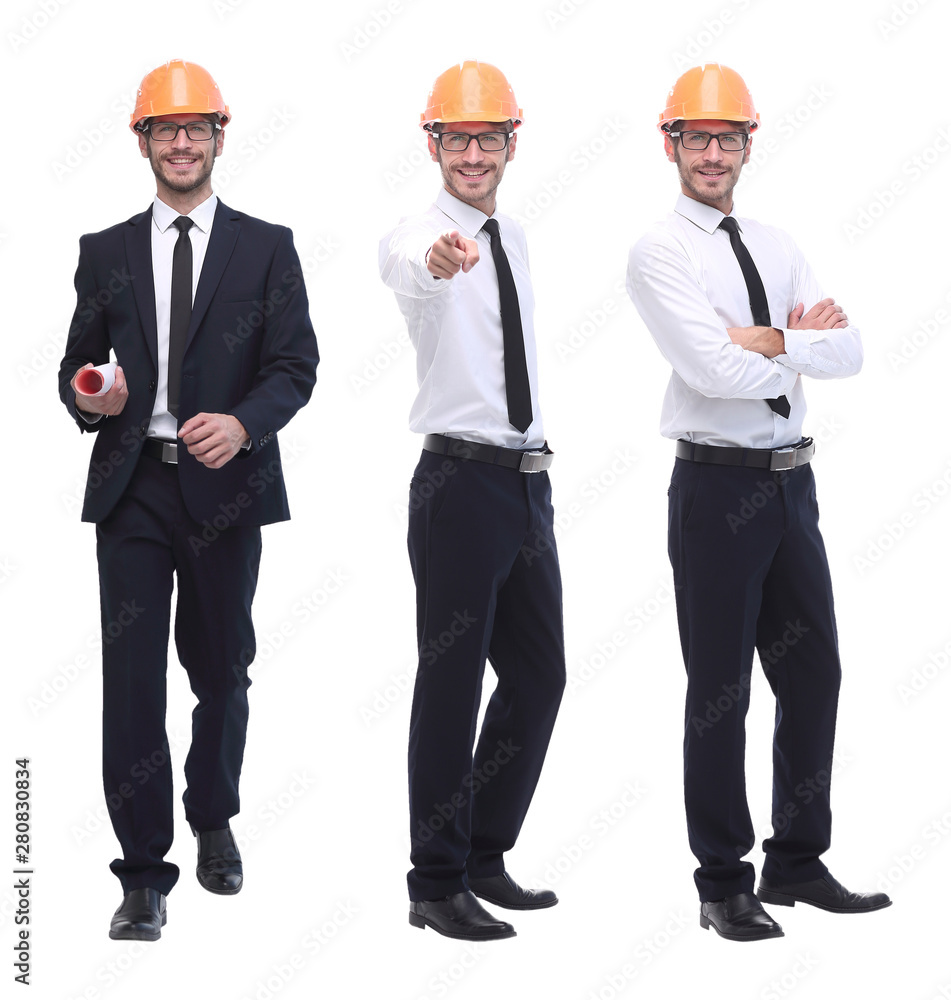 in full growth .successful architect engineer in orange helmet. in full growth .successful architect engineer in orange helmet.