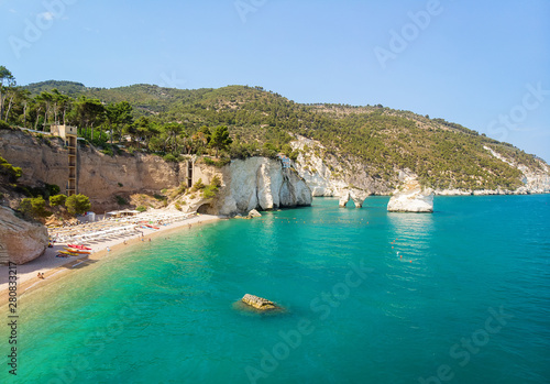 Puglia Italian summer touristic destination - Italy coastline with Baia delle Zagare beach, Gargano and Faraglioni photo