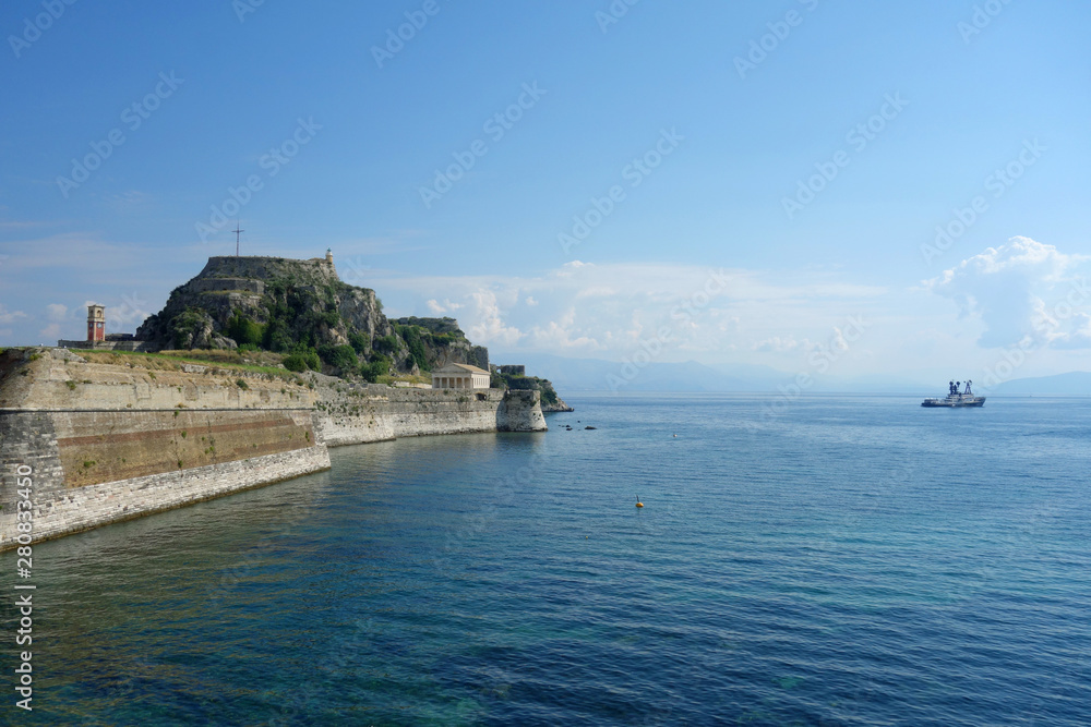 View at Ionian sea in Corfu Town, ships, boats, canyon, old fortress