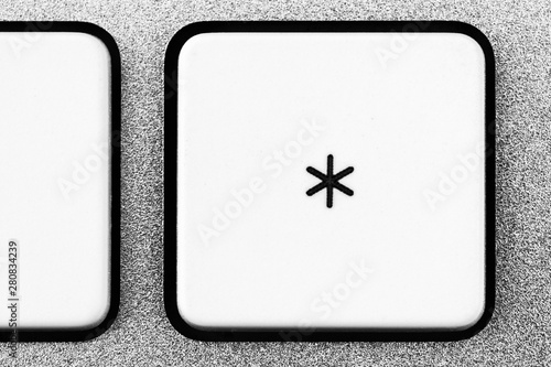 White aluminum keyboard asterisk button photo