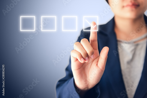 Business Woman Pressing Satisfaction Check List Icon for Customer Feedback on Touch Screen., Media Survey or Poll Questionnaire, Efficiency Performance Concept, Multimedia Iconic Surveying Data.