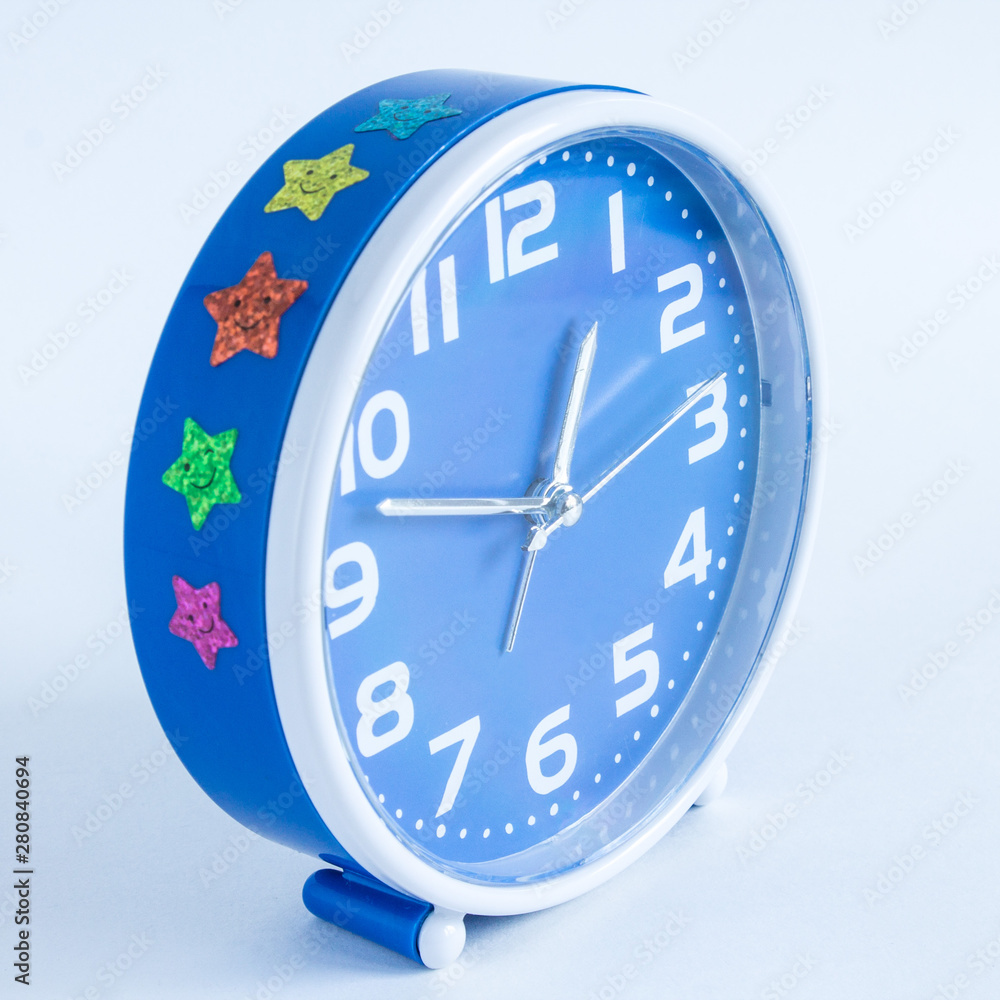 Blue round alarm clock on white background Blue round alarm clock on white background