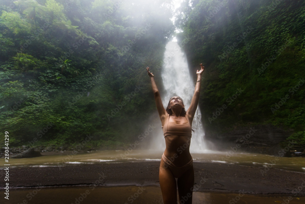 Pretty girl at Sekumpul Waterfall, Bali