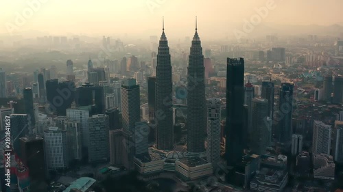Drone Aerial view 4k Footage of Kuala Lumpur city skyline on sunset in Malaysia.	