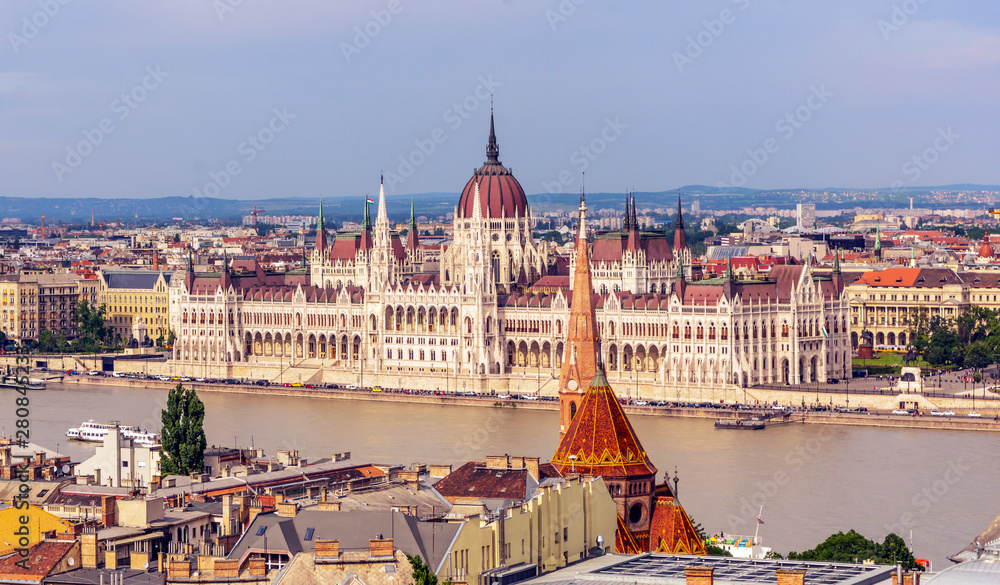 Aerial view of Budapest at point view in the Danube river in a cloudy day.