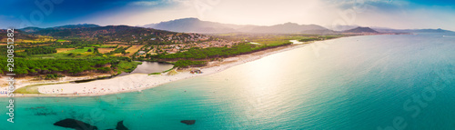 Graniro beach with Santa Lucia old town on the Sardinia Island, Italy photo