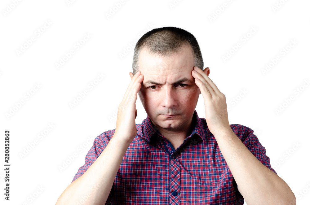 Headache caused by a cold. A man holds his head with both hands Headache caused by a cold. A man holds his head with both hands