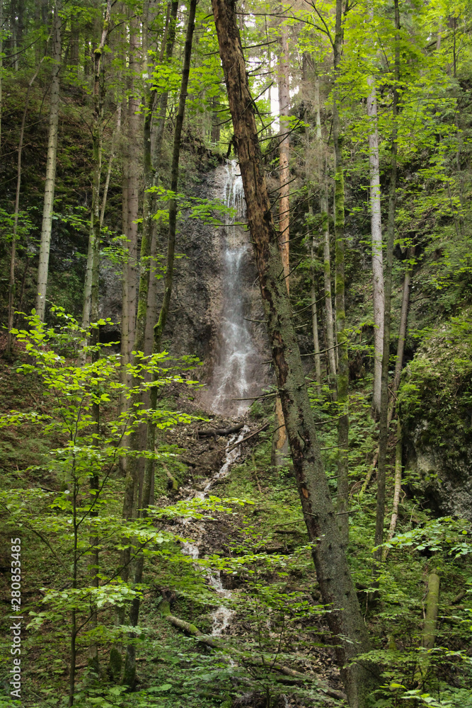 Obraz premium Beautiful waterfalls on the tourist trail in Slovak Paradise National Park, Slovaki