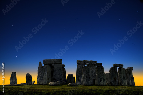 Stonehenge an ancient prehistoric stone monument from Bronze and Neolithic ages, constructed as a ring near Salisbury with dramatic sky, Wiltshire in England, United Kingdom
