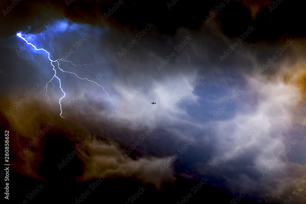 Airplane through the lightning storm