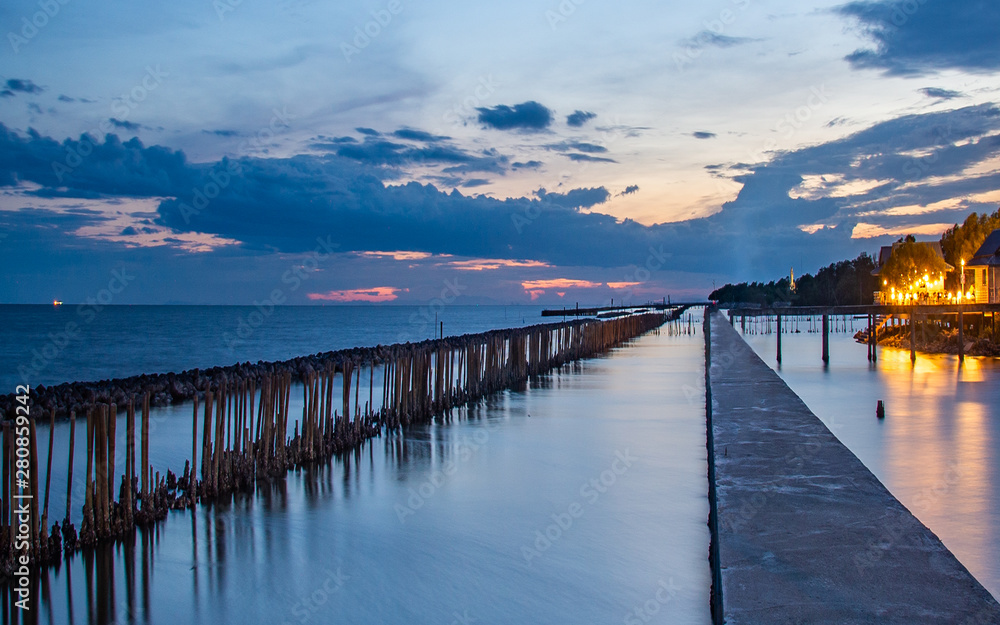 Beautiful of The walkway bridge in evening at Bang Khun Thian sea view, Bang Khun Thian, Bangkok. Beautiful of The walkway bridge in evening at Bang Khun Thian sea view, Bang Khun Thian, Bangkok.