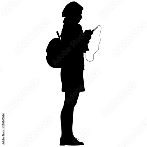 silhouette of girl with backpack and phone