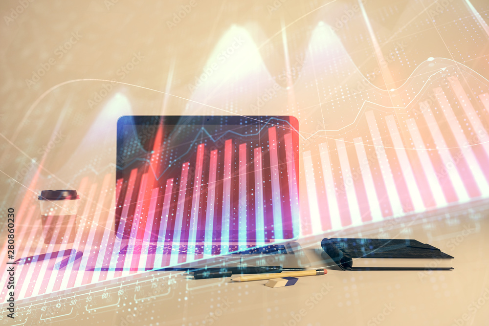Forex graph hologram with desktop office computer background. Double exposure. Concept of financial analysis. Forex graph hologram with desktop office computer background. Double exposure. Concept of financial analysis.