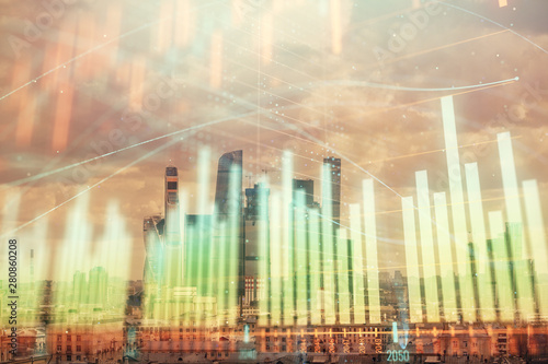 Double exposure of financial graph on downtown veiw background. Concept of stock market research and analysis © Andrey