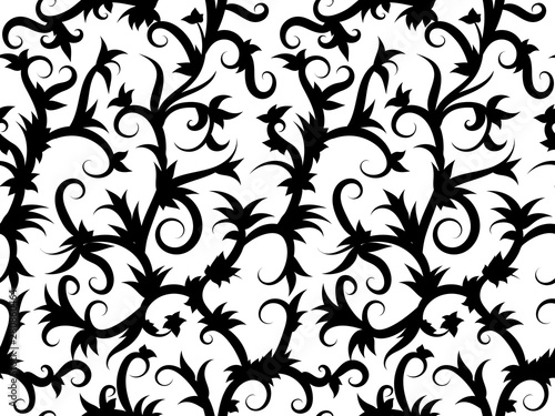 Seamless background of swirling tropical vines in black and white. Print for fabric.