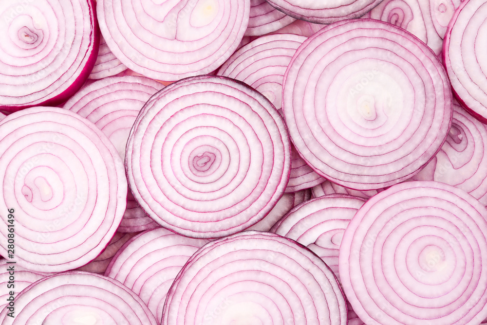 Onion slices as a background. Top view. Onion slices as a background. Top view.