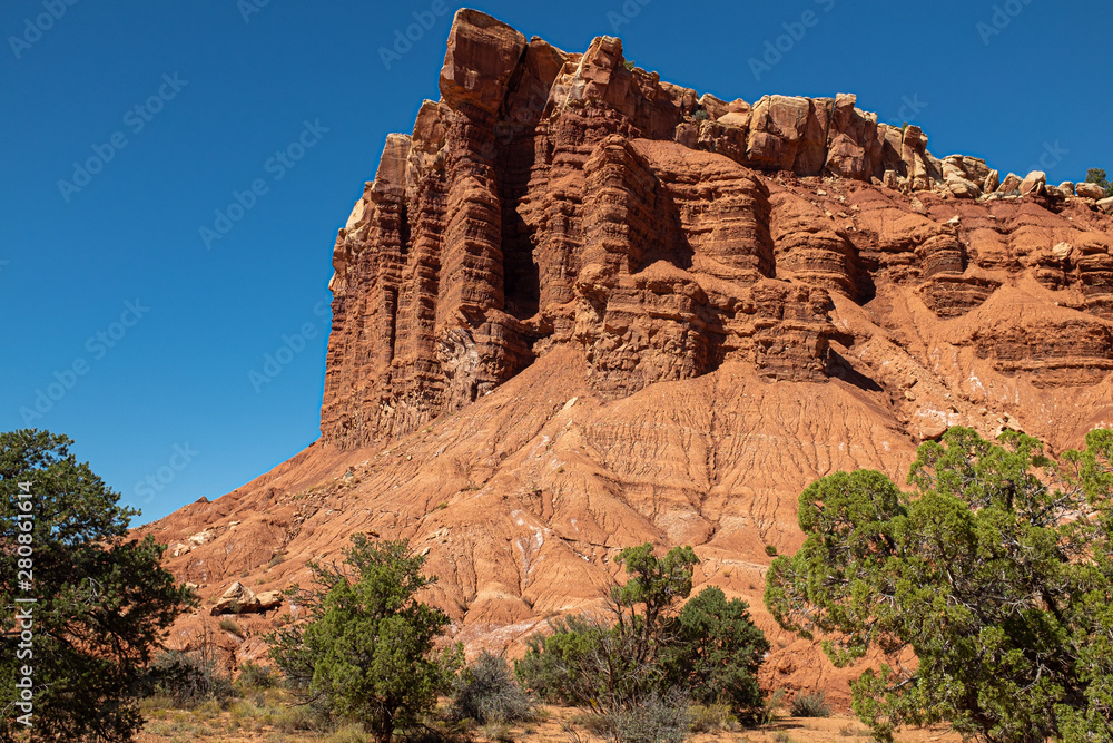 A close up of an impressive-looking rock formation, various shades of red, rugged and barren Canyonlands National Park, Utah