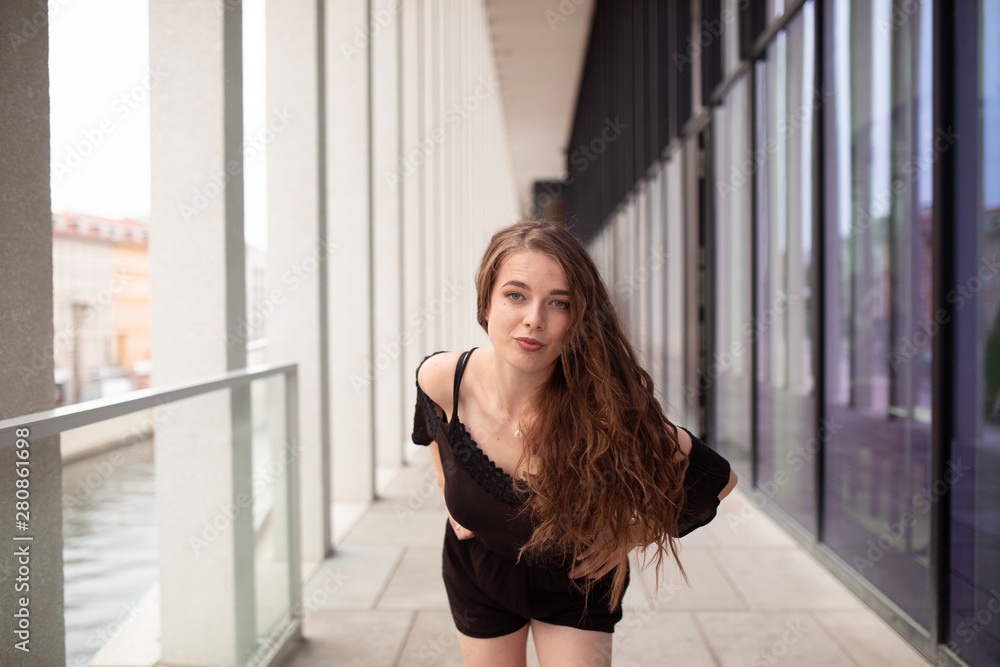 Fototapeta premium Girl doing things on street