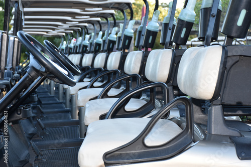 rows of chairs golf cart