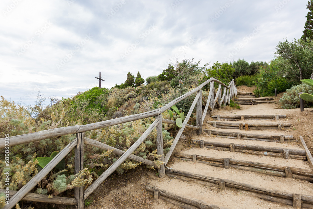 Wooden stairs way on a green garden in Italy, Tropea Wooden stairs way on a green garden in Italy, Tropea