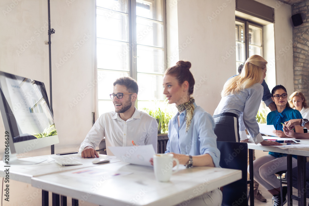 Group of business people and designers.They working on new project.Startup concept. Group of business people and designers.They working on new project.Startup concept.