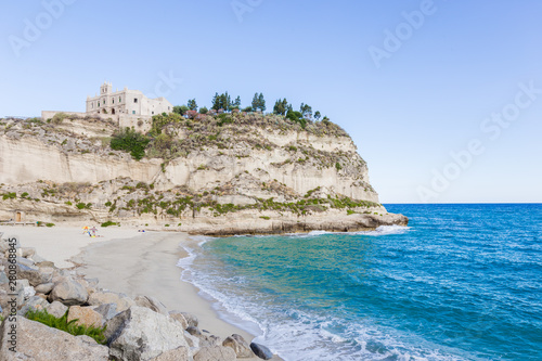 Former 4th century monastery on top of the Sanctuary of Santa Maria Island - Tropea, Calabria, Italy. Tropea Beach at Tyrrhenian Sea.