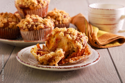 Fruit muffins with crumble topping, served