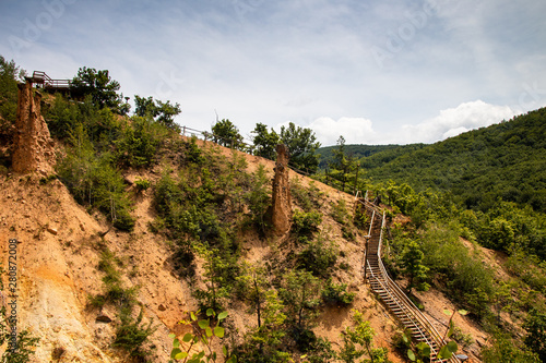 Devil's town (Djavolja Varos), Sandstone structures with stones on top. Interesting rock formations made by strong erosion on Radan mountain in Serbia. photo