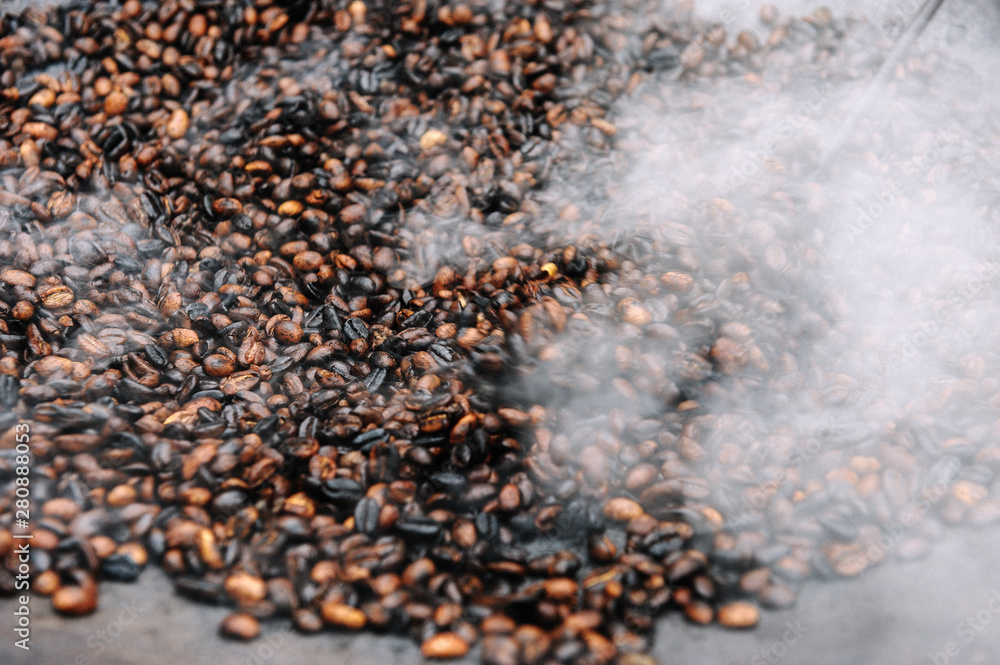 Traditional Ethiopian coffee beans roasting, Roasted coffee bean pile Traditional Ethiopian coffee beans roasting, Roasted coffee bean pile