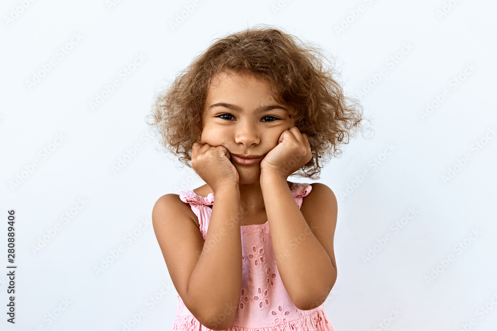 Tired,boredom and exhausted emotion Little African American girl portrait against white background Tired,boredom and exhausted emotion Little African American girl portrait against white background