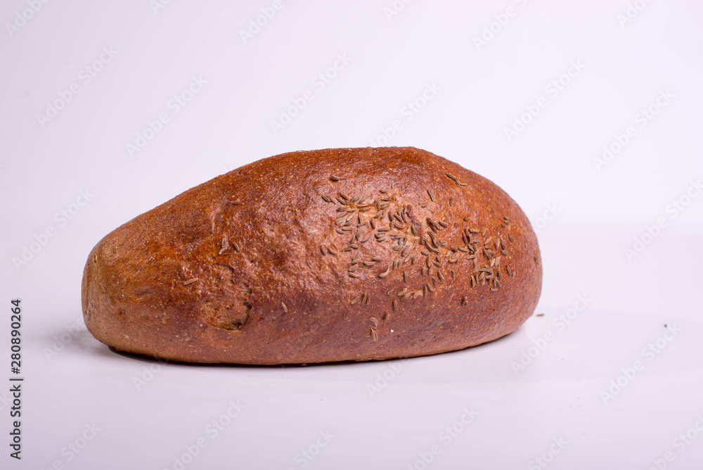 Gray bread on a white background. Insulated Baking Loaf Gray bread on a white background. Insulated Baking Loaf