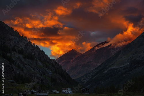 Red sunset in italian Alps