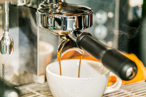 Coffee with various options.Espresso machine making coffee in cup. Brewing coffee with espresso machine