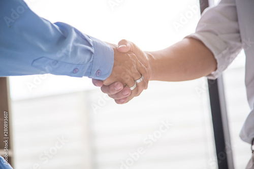 Business handshake Between manager to further invest in the future.power concept