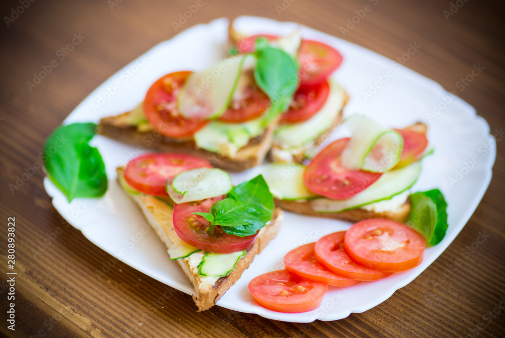 tasty sandwich with curd paste, fresh cucumbers and tomatoes tasty sandwich with curd paste, fresh cucumbers and tomatoes