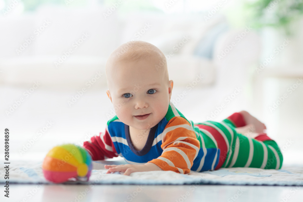 Baby boy with toys and ball Baby boy with toys and ball