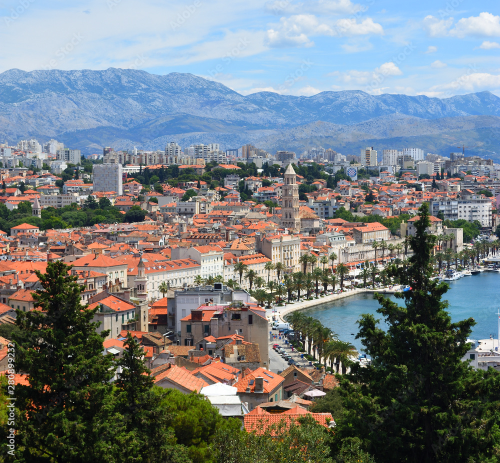 View of  Split  Seafront and old town with mountains in background.