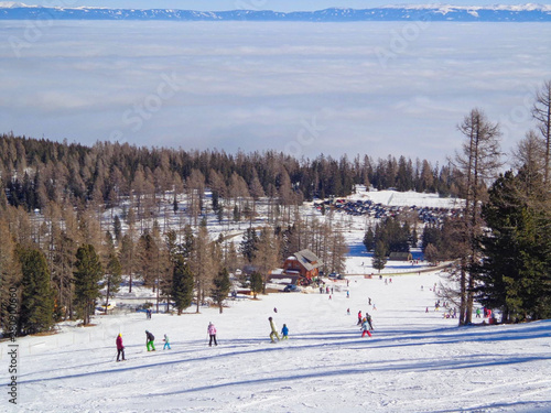 a ski-run with people on it