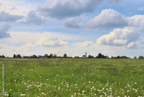 Sommerwiese und weiß blauer Himmel, Ludenhausen, Landkreis Landsberg, Kirche  photo