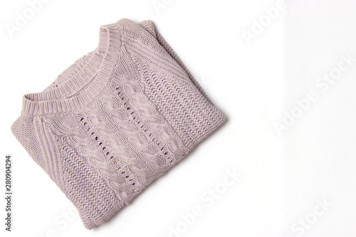 Sweater on a white background top view.