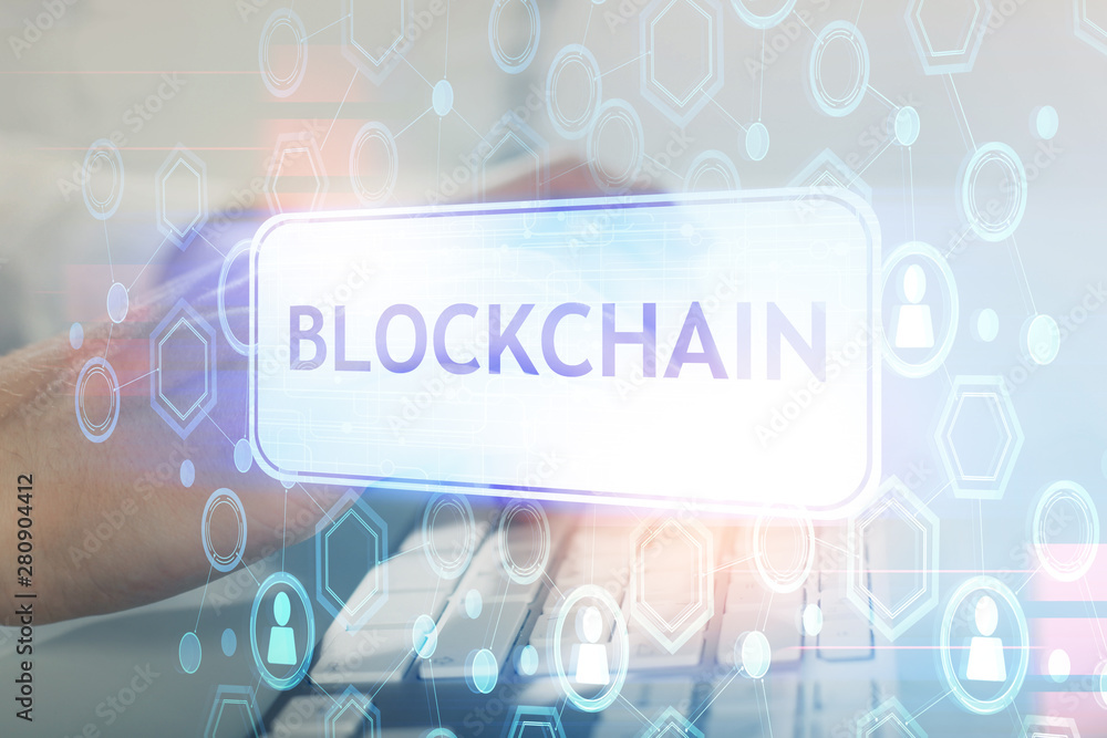 Crypto currency theme hologram with businessman working on computer on background. Concept of blockchain. Multi exposure. Crypto currency theme hologram with businessman working on computer on background. Concept of blockchain. Multi exposure.
