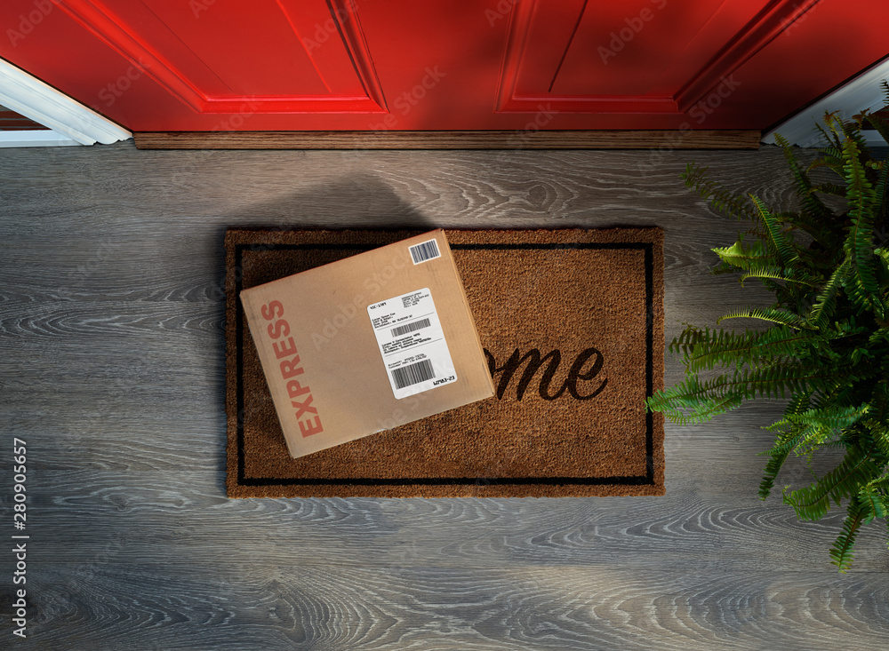 © Mstock - Expedited delivery box outside front door. Overhead view © Mstock - Expedited delivery box outside front door. Overhead view