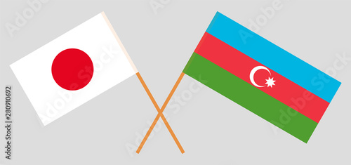 Azerbaijan and Japan. Crossed Azerbaijani and Japanese flags